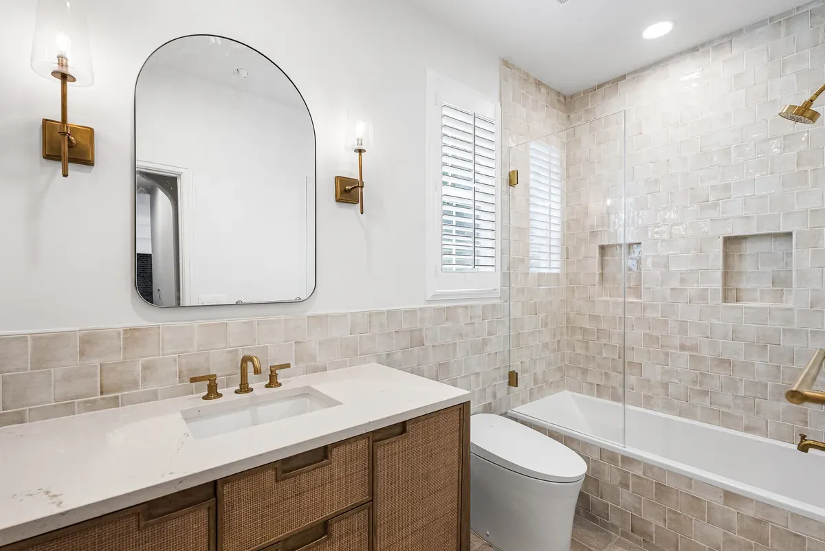 Remodeled bathroom with oak vanity, handmade tile and brass fixtures, Dublin CA