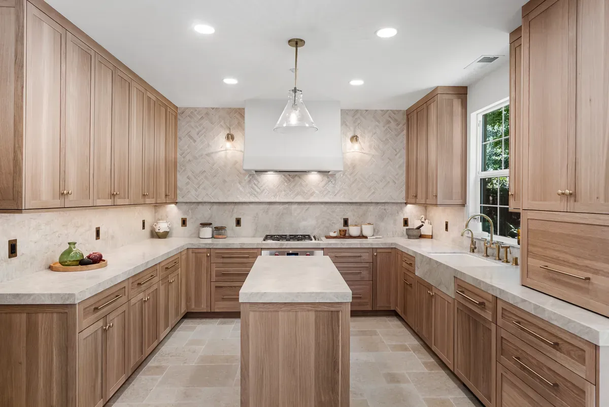 White oak kitchen with stone island and window light, Dublin full home remodel